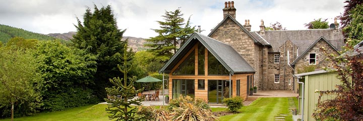 An exterior view of Craigatin House, garden and terrace