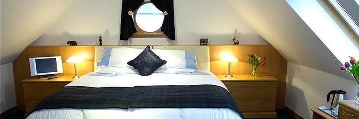 Double bedroom at the Dormie House guest house in Prestwick