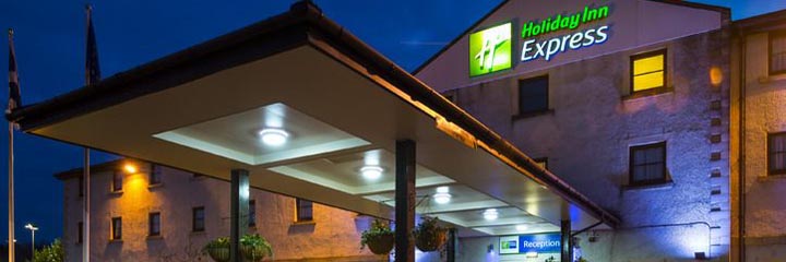 An exterior view of the Holiday Inn Express Perth at night