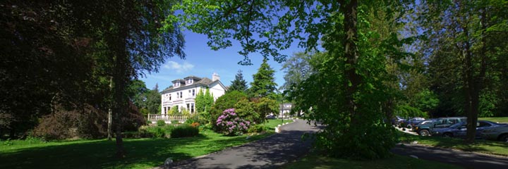 An exterior view of the Marcliffe Hotel and Spa and grounds