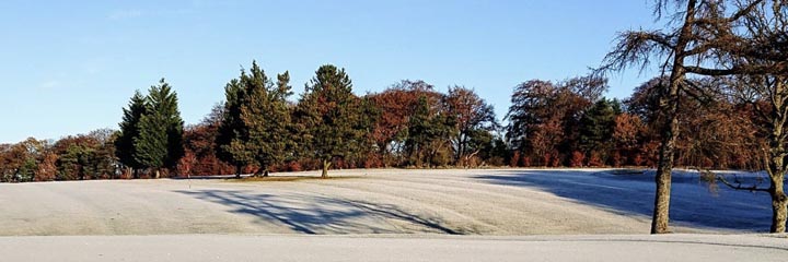 a view across the woodland course of Airdrie Golf Club