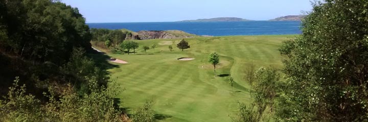 The 6th hole at the 9 hole Gairloch Golf Club looking across the course to sea