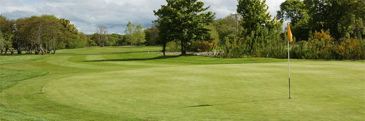 Looking down the tree-lined fairway from one of the greens at Garmouth and Kingston Golf Club