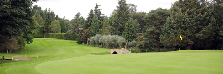 Looking back from the 9th green at Inverness Golf Club to the tee