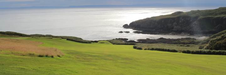 A view to the sea across the 14th hole of the Dunskey course at Portpatrick Golf Club