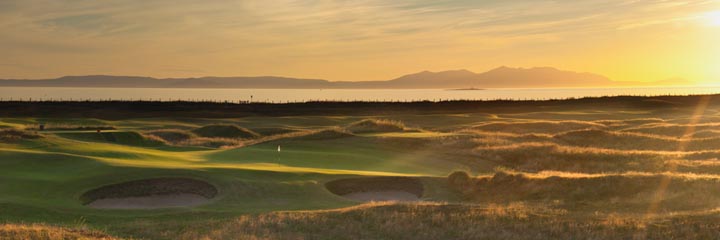 A view of Prestwick Golf Club with the Firth of Clyde and Isle of Arran in the background