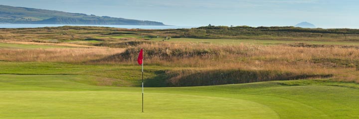 A view across Prestwick golf course to the Firth of Clyde with Ailsa Craig in the distance