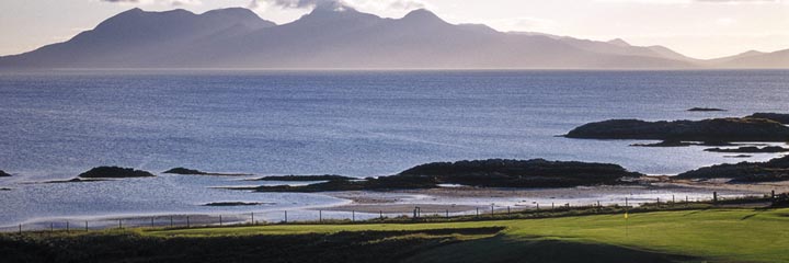 The 5th hole at Traigh golf course with a view to Rum