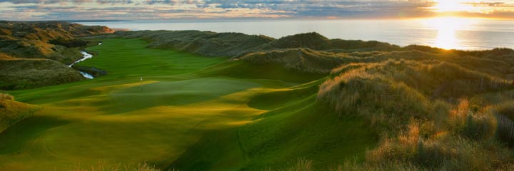 A view of the 4th green and fairway at Trump International Golf Links north of Aberdeen, with the North Sea behind