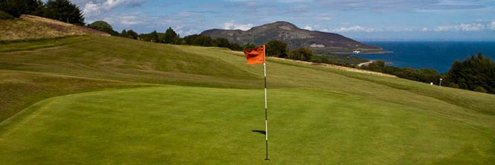 The 13th hole at Whiting Bay Golf Club looking to Holy Isle and the Firth of Clyde